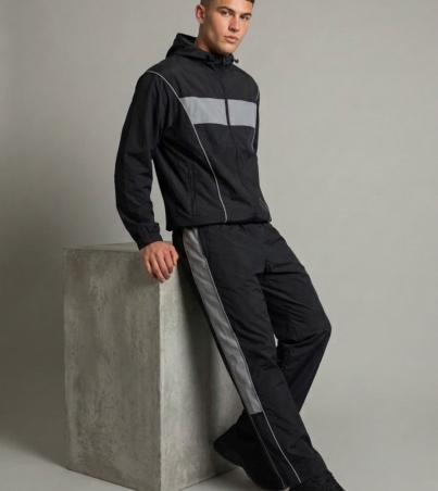 Man_wearing_black_tracksuit_202608291738
