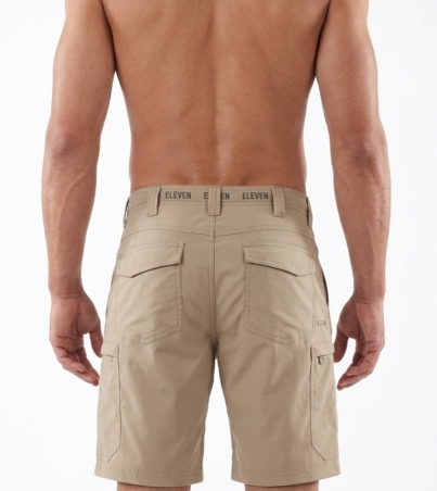 Man_wearing_beige_tactical_shorts_20260911182314