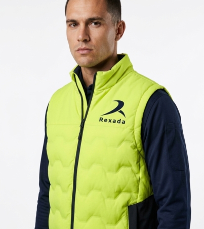 Man_wearing_yellow_quilted_vest_202609020028
